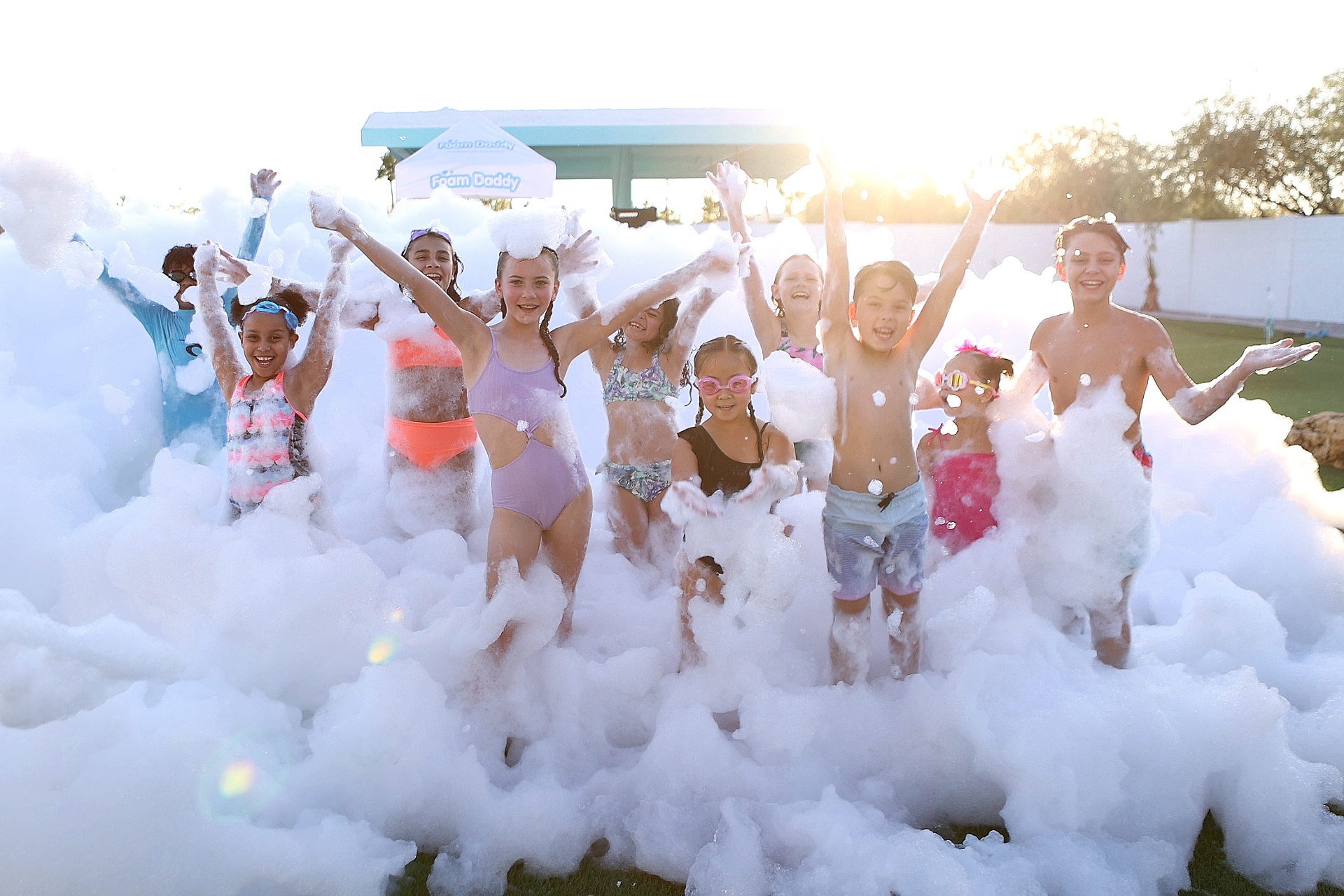 Kids celebrating at a foam party